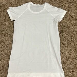 White swiftly tech lulu shirt size 6